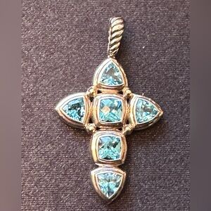 Elegant Silver and Blue Gemstone Cross Pendant